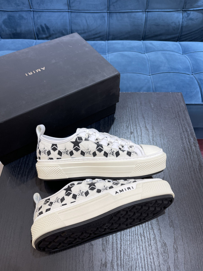 amiri* appliquéd leather and canvas sneakers